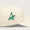 Cream baseball cap with tone-on-tone "Golden" patch and green star pin