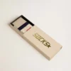 Cream ribbed socks with navy blue details and red logo