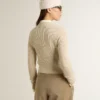 Cropped round-neck sweater in beige wool with all-over crystals
