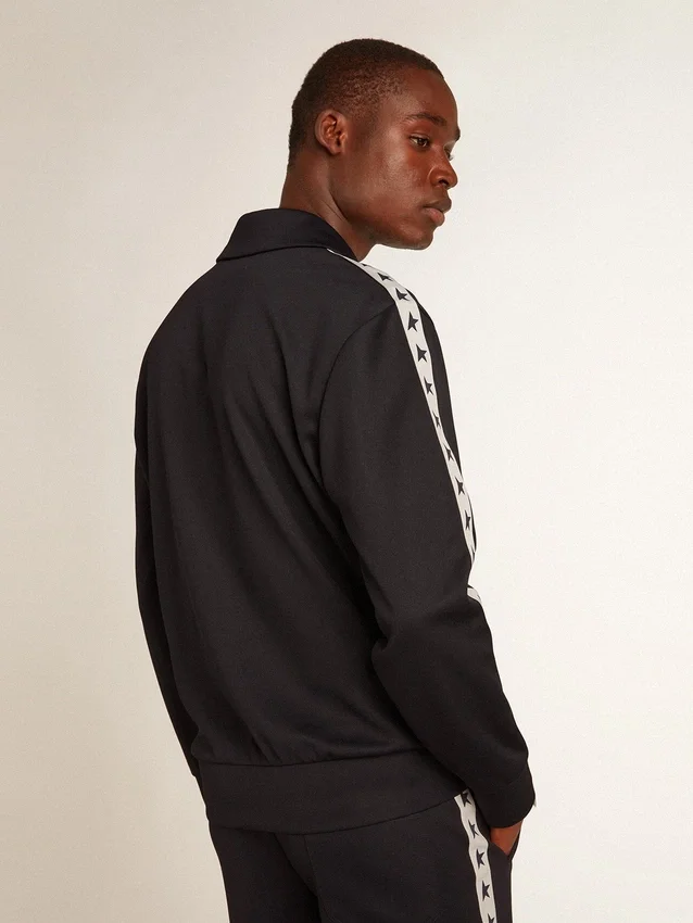 Dark blue sweatshirt with white strip and contrasting blue stars