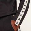 Dark blue sweatshirt with white strip and contrasting blue stars