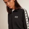 Dark blue zipped sweatshirt with white strip and contrasting stars