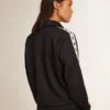Dark blue zipped sweatshirt with white strip and contrasting stars