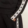 Dark blue zipped sweatshirt with white strip and contrasting stars