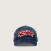 Denim blue baseball cap with red and white terry “Golden” patch