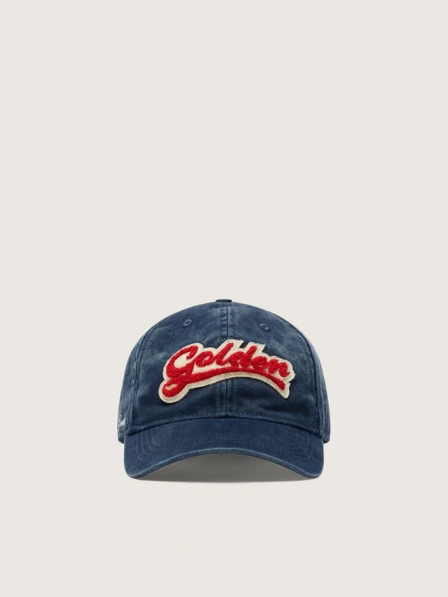 Denim blue baseball cap with red and white terry “Golden” patch