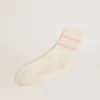 Distressed-finish white socks with baby-pink logo and stripes