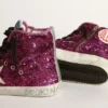 Francy sneakers with sequins and handwritten lettering on the outsole