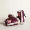 Francy sneakers with sequins and handwritten lettering on the outsole