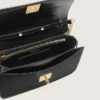 Gioia Bag in black boarded leather with gold details