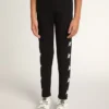 Girls’ black leggings with white stars on the sides