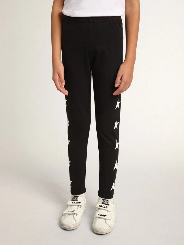 Girls’ black leggings with white stars on the sides