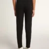 Girls’ black leggings with white stars on the sides