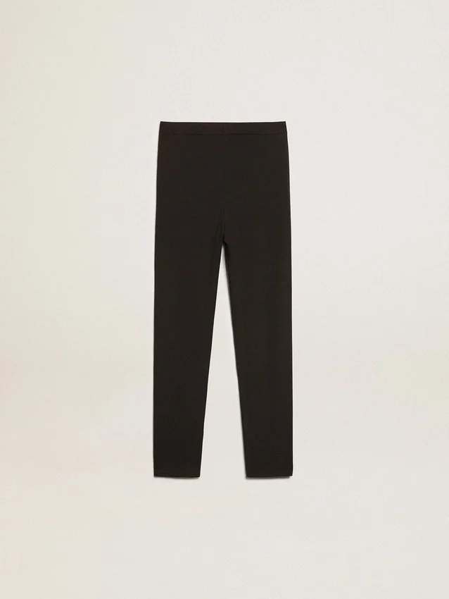 Girls’ black leggings with white stars on the sides