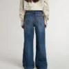 Girls' bootcut jeans with a medium wash and embroidery