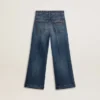 Girls' bootcut jeans with a medium wash and embroidery