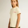 Girls' cotton T-shirt in worn white with red embroidery on the chest