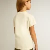 Girls' cotton T-shirt in worn white with red embroidery on the chest