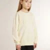 Girls’ cream-colored sweatshirt with patch writing