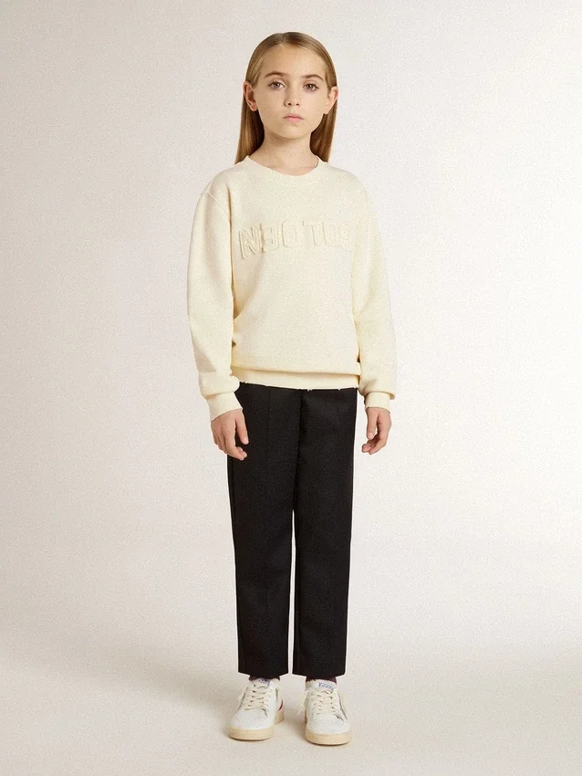 Girls’ cream-colored sweatshirt with patch writing