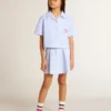 Girls' cropped shirt in striped light blue cotton