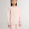 Girls' pink-colored sweatshirt with pink front lettering