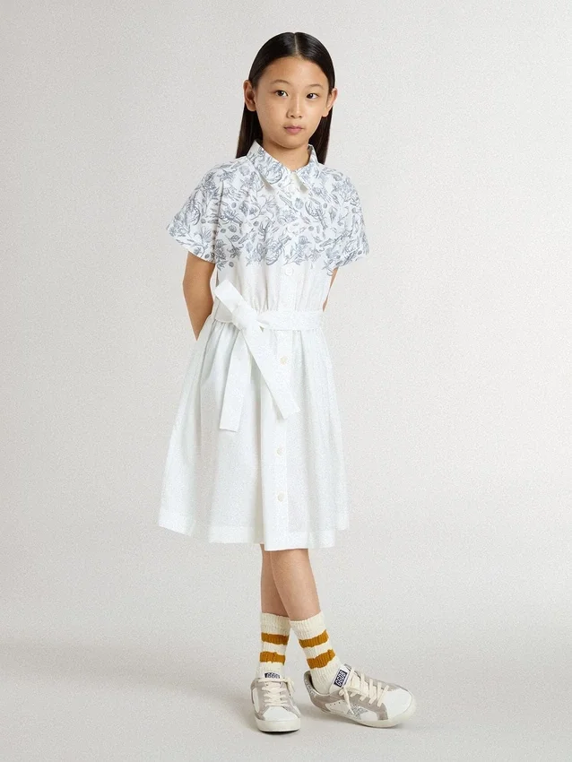 Girls’ shirt dress in white cotton canvas with a blue nautical print and white piping