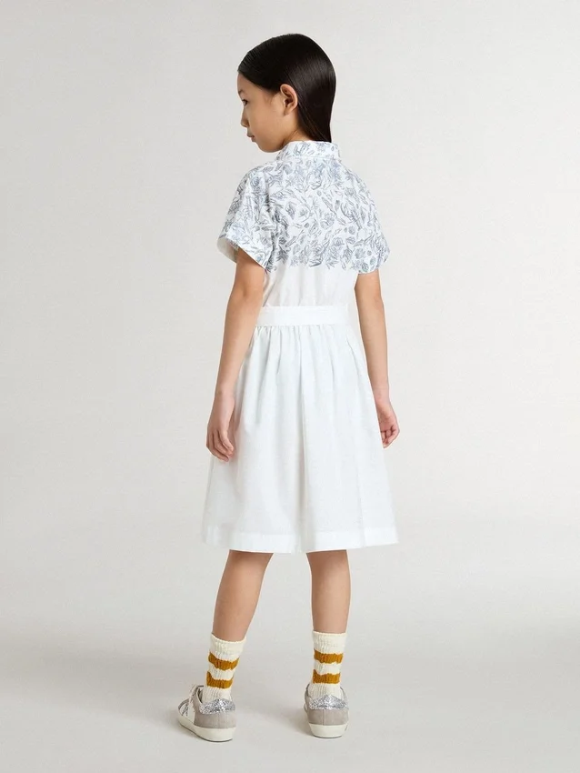 Girls’ shirt dress in white cotton canvas with a blue nautical print and white piping
