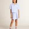 Girls' skirt with light blue stripes