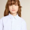 Girls’ striped shirt with embroidered lettering on the pocket