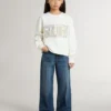 Girls' white sweatshirt with multicolor Golden writing on the front