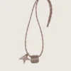 Glasses holder with beige leather hiking lace, floral clip and star clip
