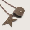 Glasses holder with beige leather hiking lace, floral clip and star clip