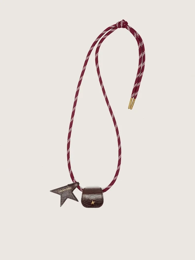 Glasses holder with burgundy and white striped leather hiking lace and two floral clips