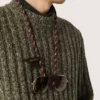 Glasses holder with burgundy and white striped leather hiking lace and two floral clips