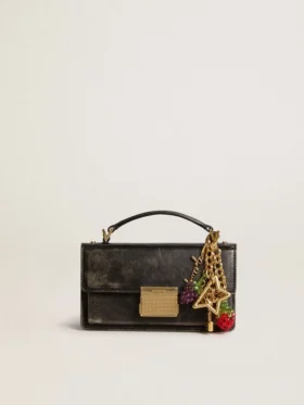 Gold-colored brass charm with Golden Goose signature