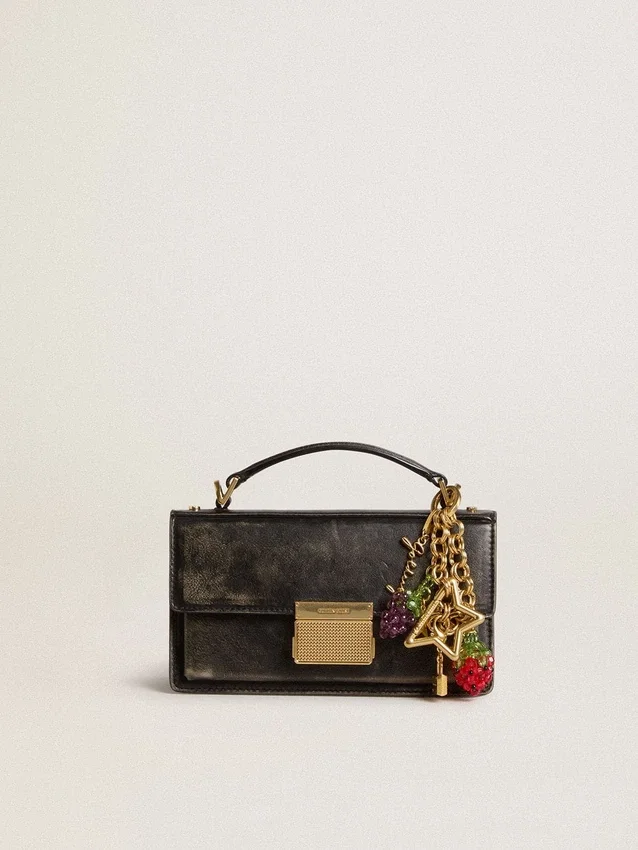 Gold-colored brass charm with Golden Goose signature