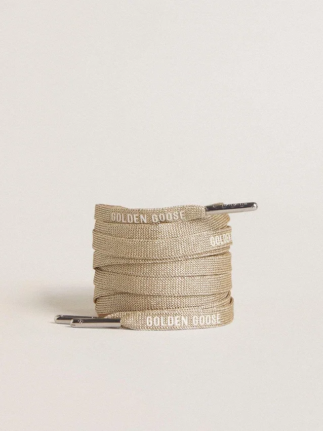 Gold-colored Lurex laces with contrasting white logo