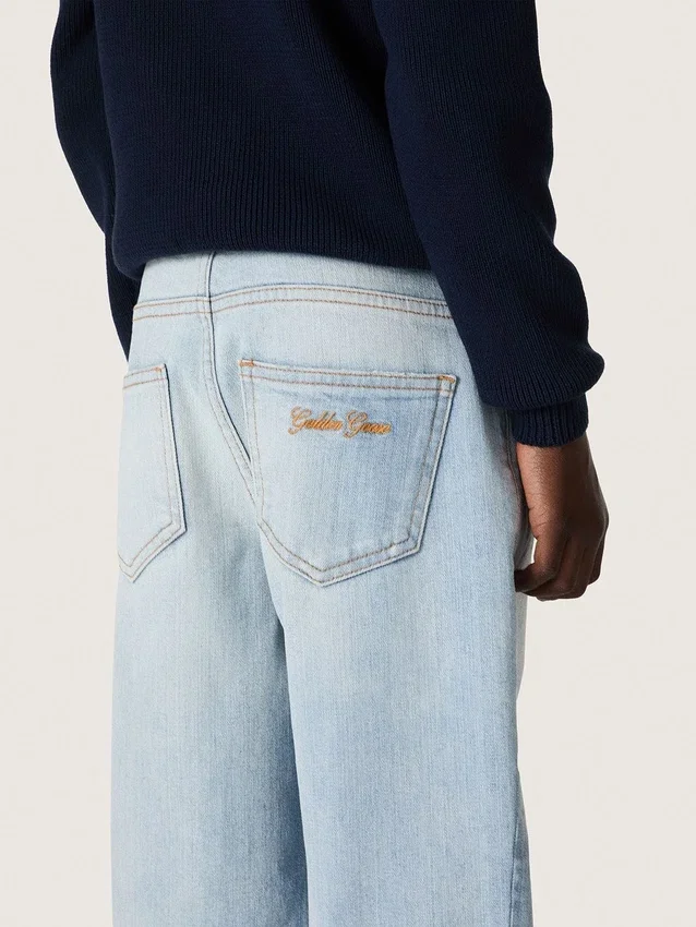 Golden boys’ jeans in light blue denim with an embroidered logo