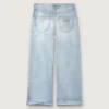 Golden girls’ bootcut jeans in light blue denim with an embroidered logo