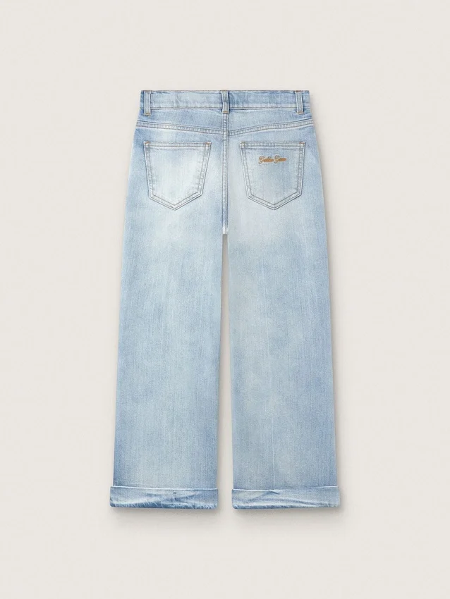 Golden girls’ bootcut jeans in light blue denim with an embroidered logo