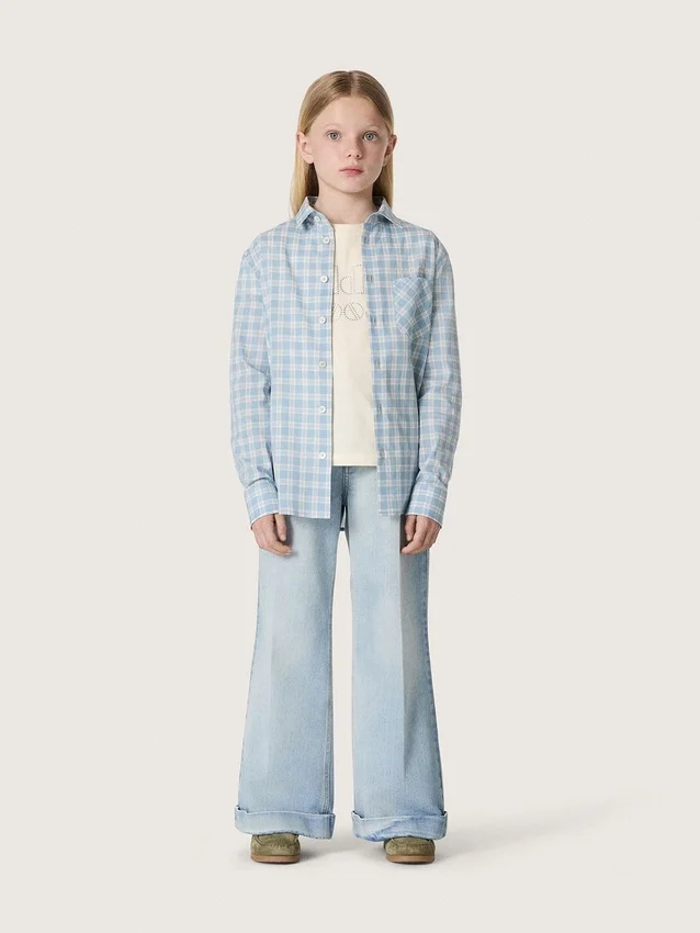 Golden girls’ bootcut jeans in light blue denim with an embroidered logo