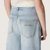 Golden girls’ bootcut jeans in light blue denim with an embroidered logo