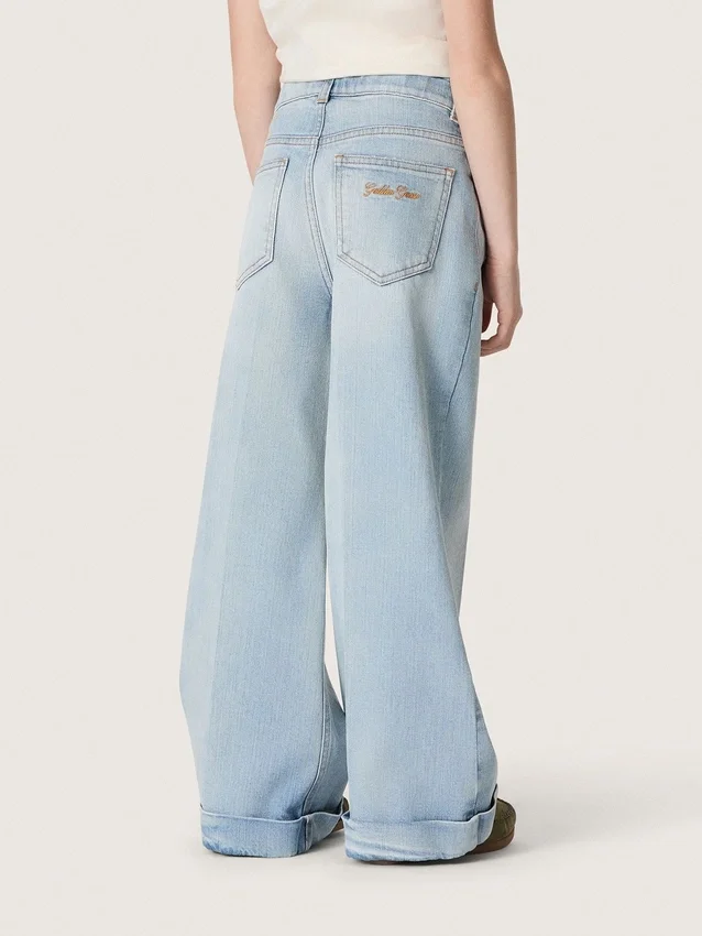 Golden girls’ bootcut jeans in light blue denim with an embroidered logo