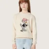 Golden girls’ sweater in white cotton yarn with mascot embroidery