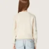 Golden girls’ sweater in white cotton yarn with mascot embroidery