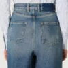 Golden women's boyfriend jeans in stone-washed light blue denim