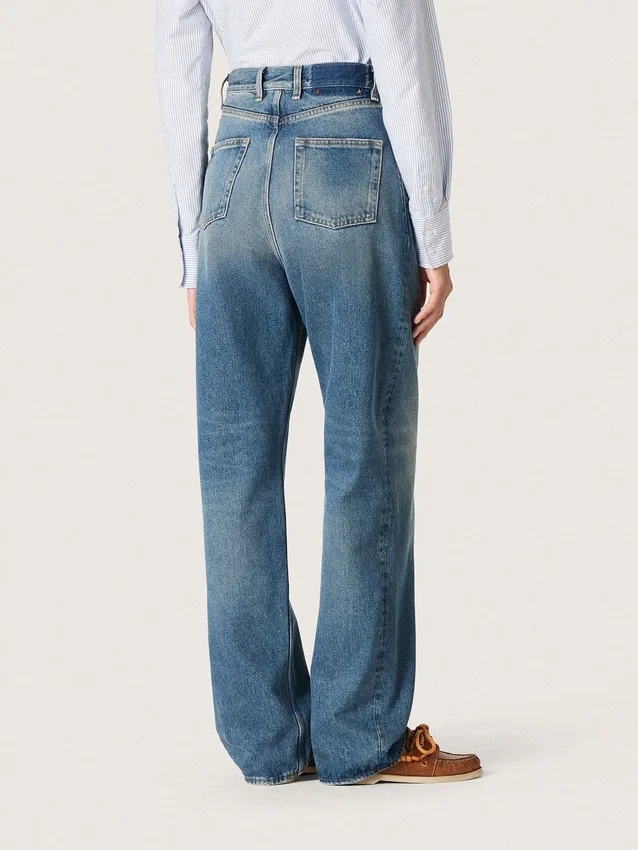 Golden women's boyfriend jeans in stone-washed light blue denim