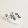 Gray and black animal-print laces with contrasting gold logo