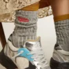 Gray ribbed socks with orange details and red logo